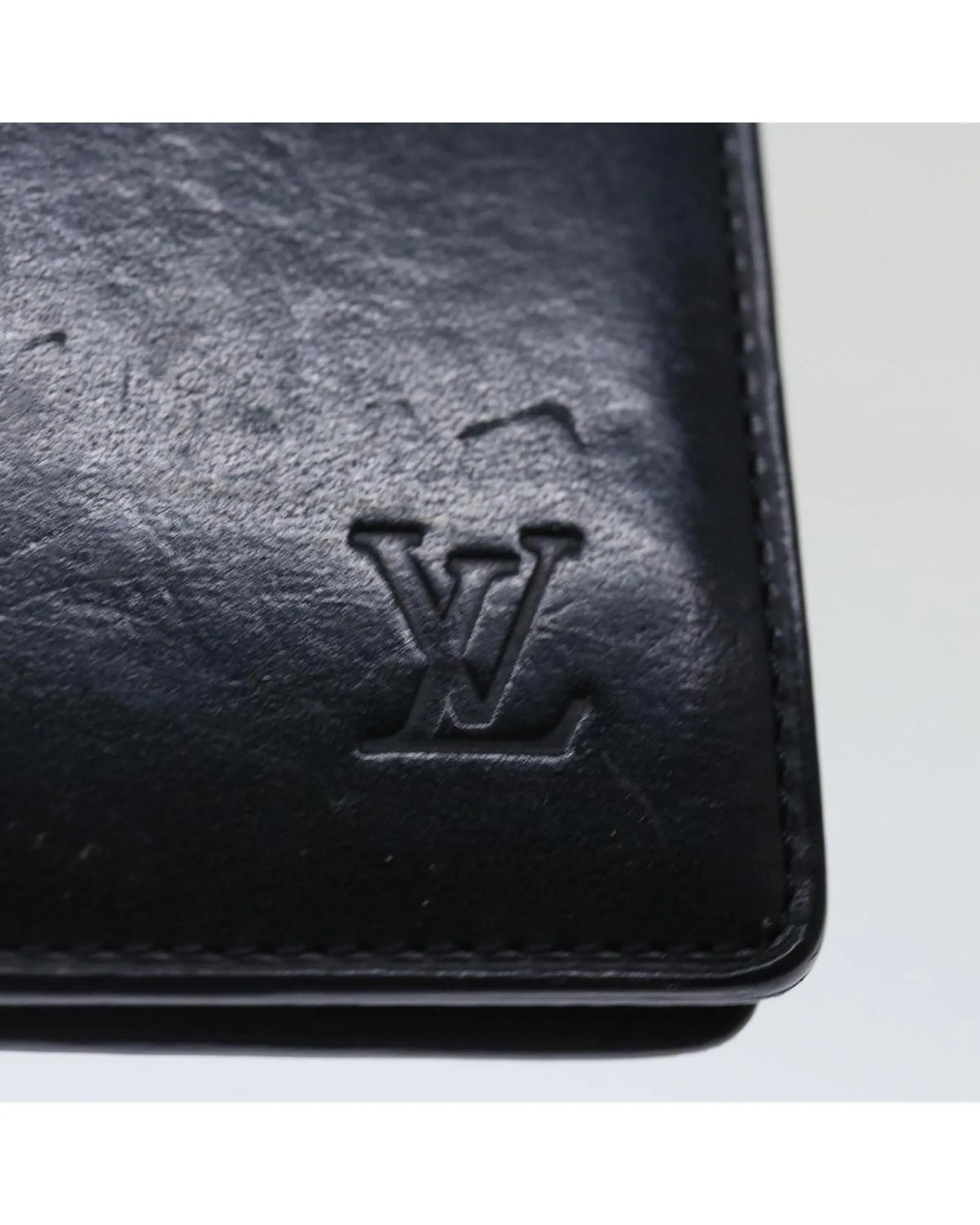 Black Leather Wallet with Multiple Pockets by Louis Vuitton